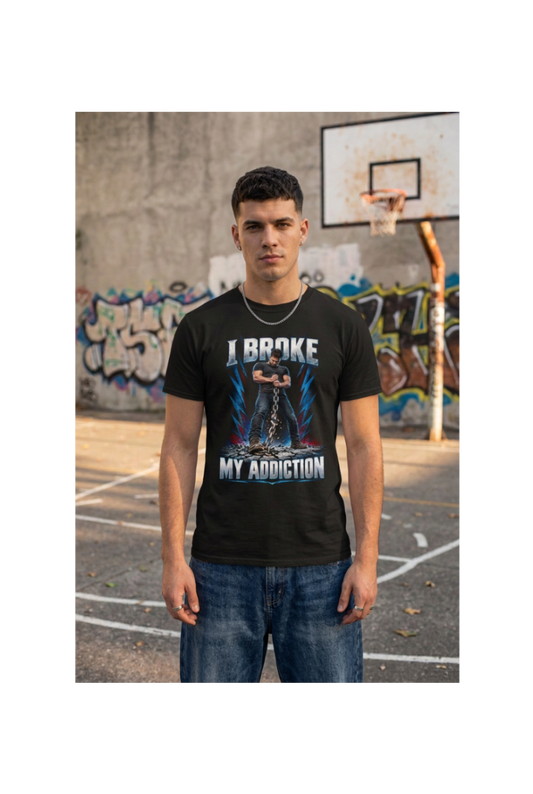 Streetwear-styled male model in the black tee at a graffiti-lined basketball court